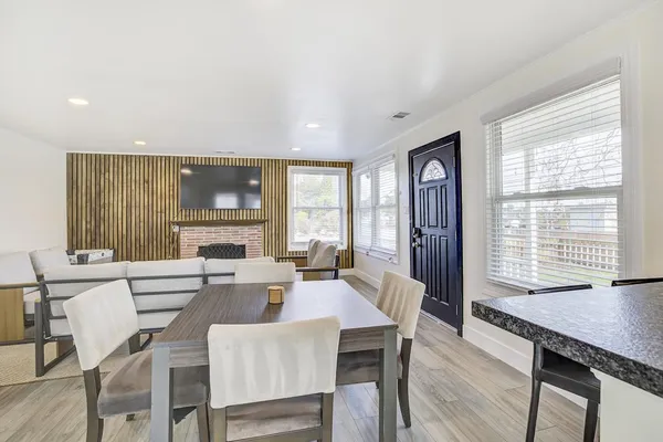 a view of a dining room with furniture window and outside view