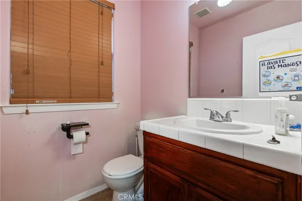 a view of outdoor dining space with a patio and fire pit