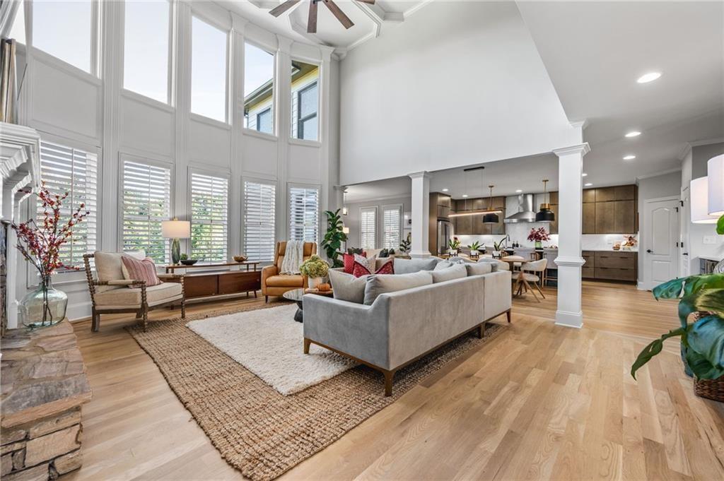 4526 Meadowland Way Flowery Branch, GA 30542 - Photo 15 of 64 a living room with furniture and a table