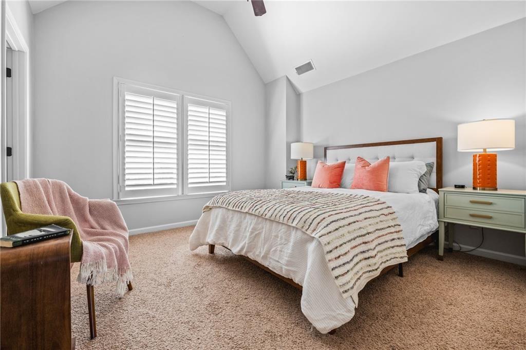 4526 Meadowland Way Flowery Branch, GA 30542 - Photo 33 of 64 a bed room with a bed and a chair