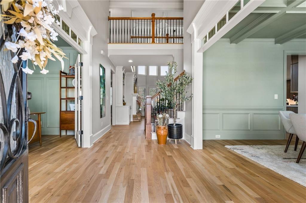 4526 Meadowland Way Flowery Branch, GA 30542 - Photo 4 of 64 a view of entryway with wooden floor