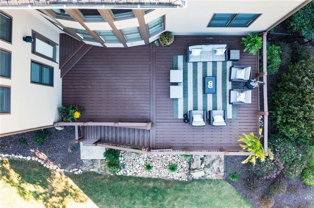 4526 Meadowland Way Flowery Branch, GA 30542 - Photo 51 of 64 a front view of a house with a yard