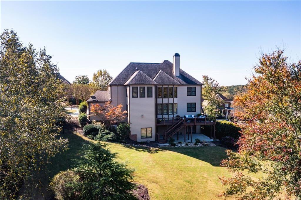 4526 Meadowland Way Flowery Branch, GA 30542 - Photo 59 of 64 a view of a house with a yard