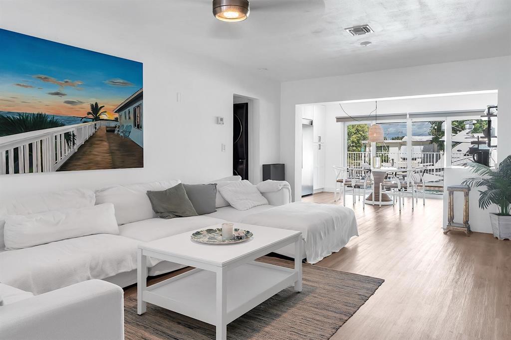 2233 Southeast 15th Street Pompano Beach, FL 33062 - Photo 17 of 53 a living room with furniture and wooden floor