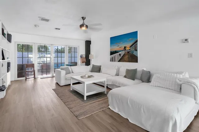 a bedroom with a bed and a table in it