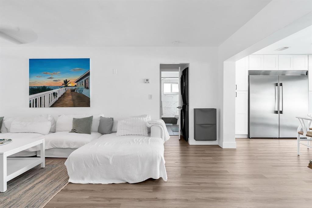 2233 Southeast 15th Street Pompano Beach, FL 33062 - Photo 38 of 53 a living room with furniture and a walk in closet