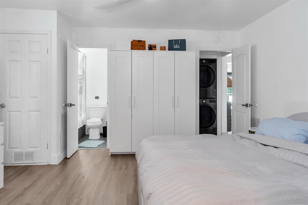 2233 Southeast 15th Street Pompano Beach, FL 33062 - Photo 44 of 53 a bedroom with a bed and a view of bathroom