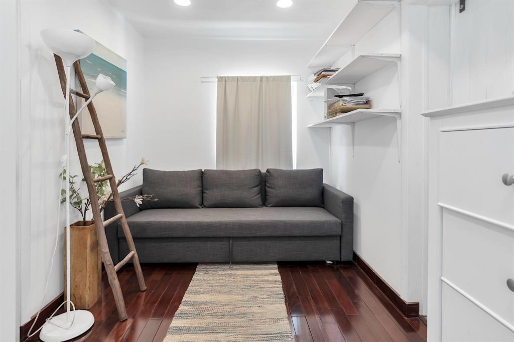 2233 Southeast 15th Street Pompano Beach, FL 33062 - Photo 45 of 53 a living room with furniture and a wooden floor