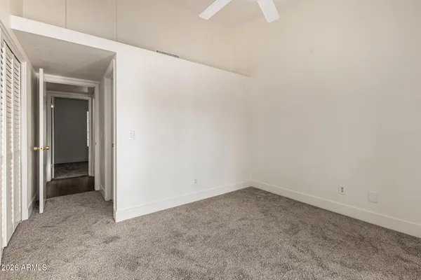 a kitchen with a stove sink and refrigerator