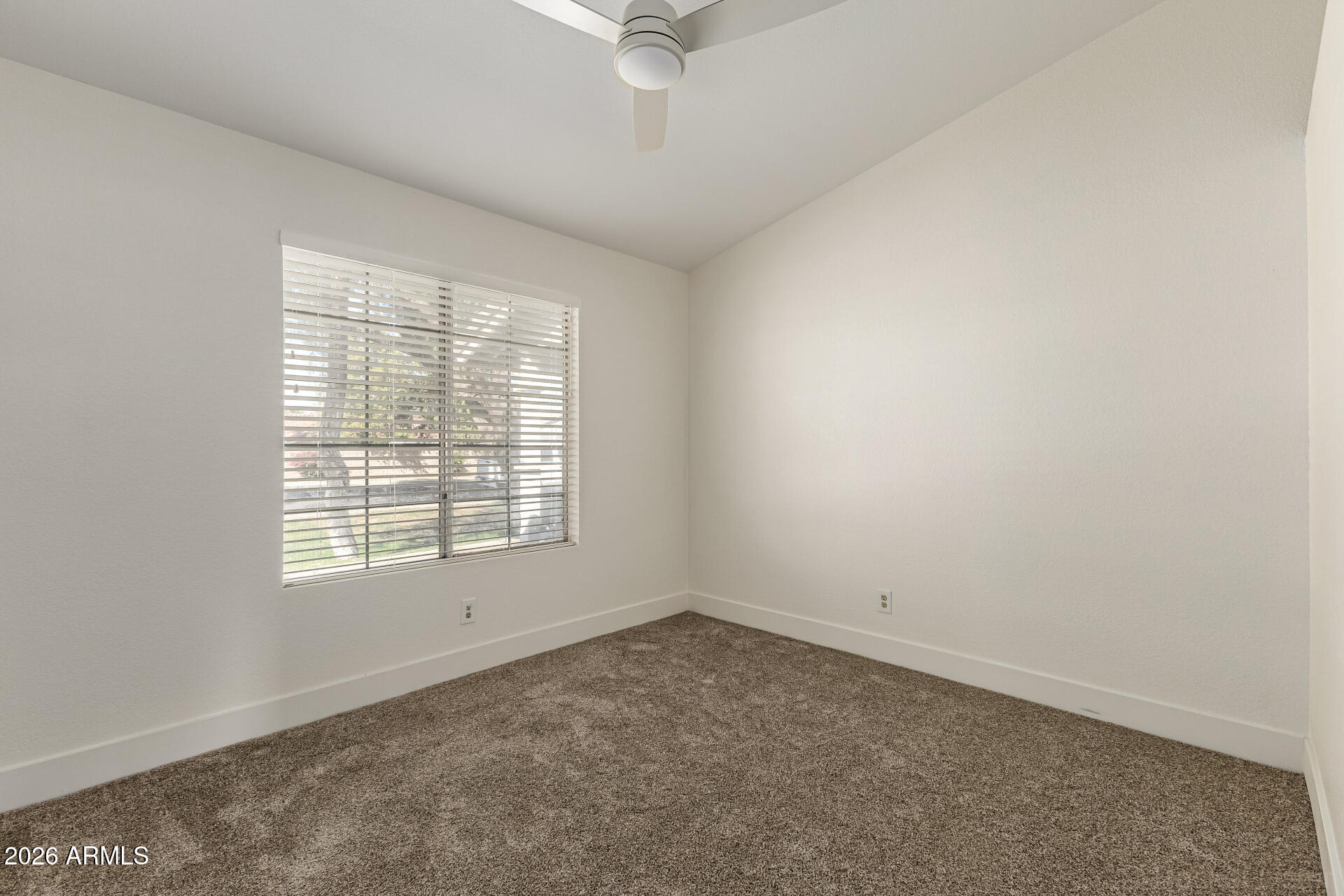 860 North McQueen Road, Unit 1092 Chandler, AZ 85225 - Photo 19 of 26 an empty room with a window