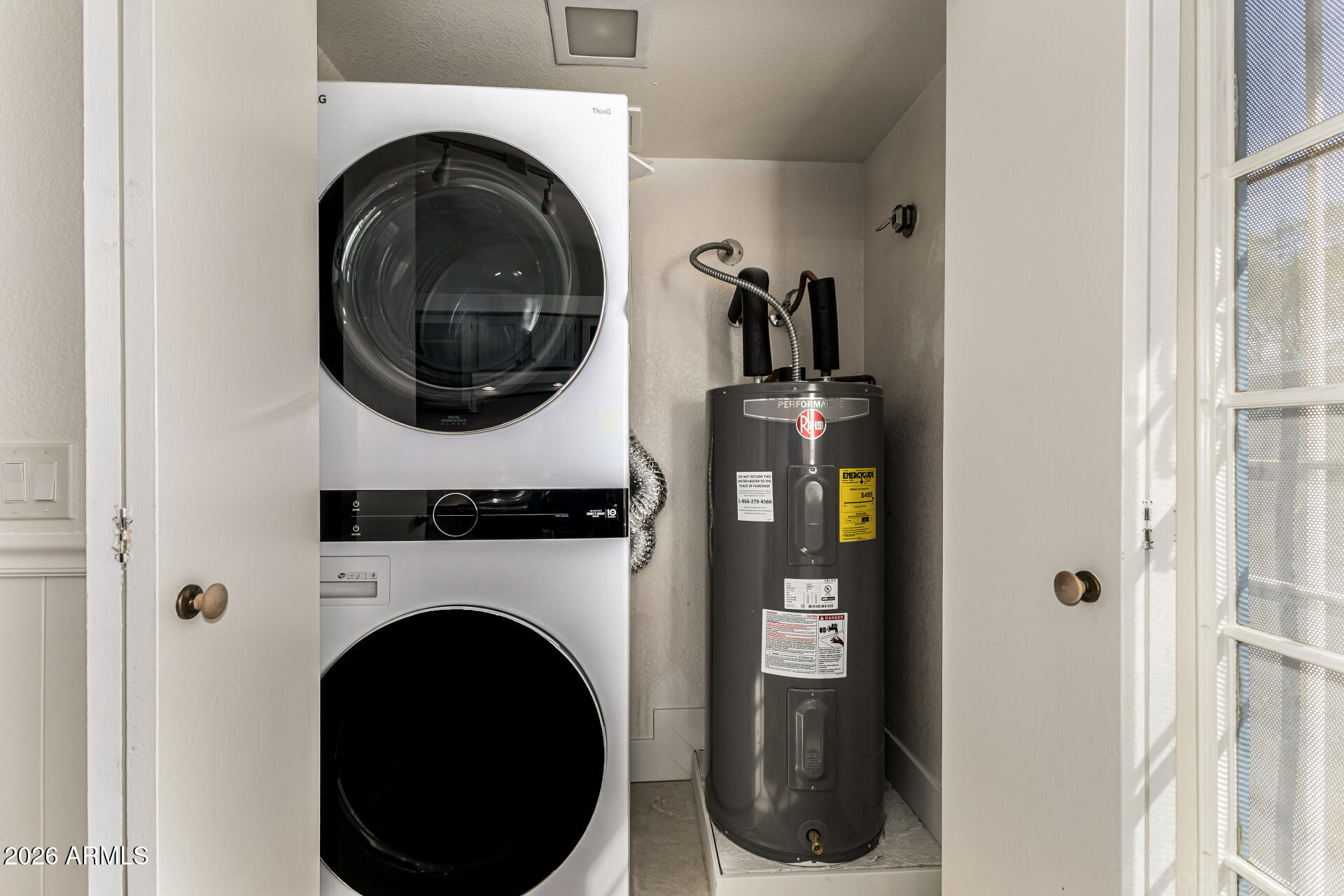 860 North McQueen Road, Unit 1092 Chandler, AZ 85225 - Photo 22 of 26 a close view of a utility room with washer and dryer