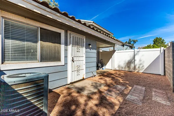 a close view of a utility room with washer and dryer