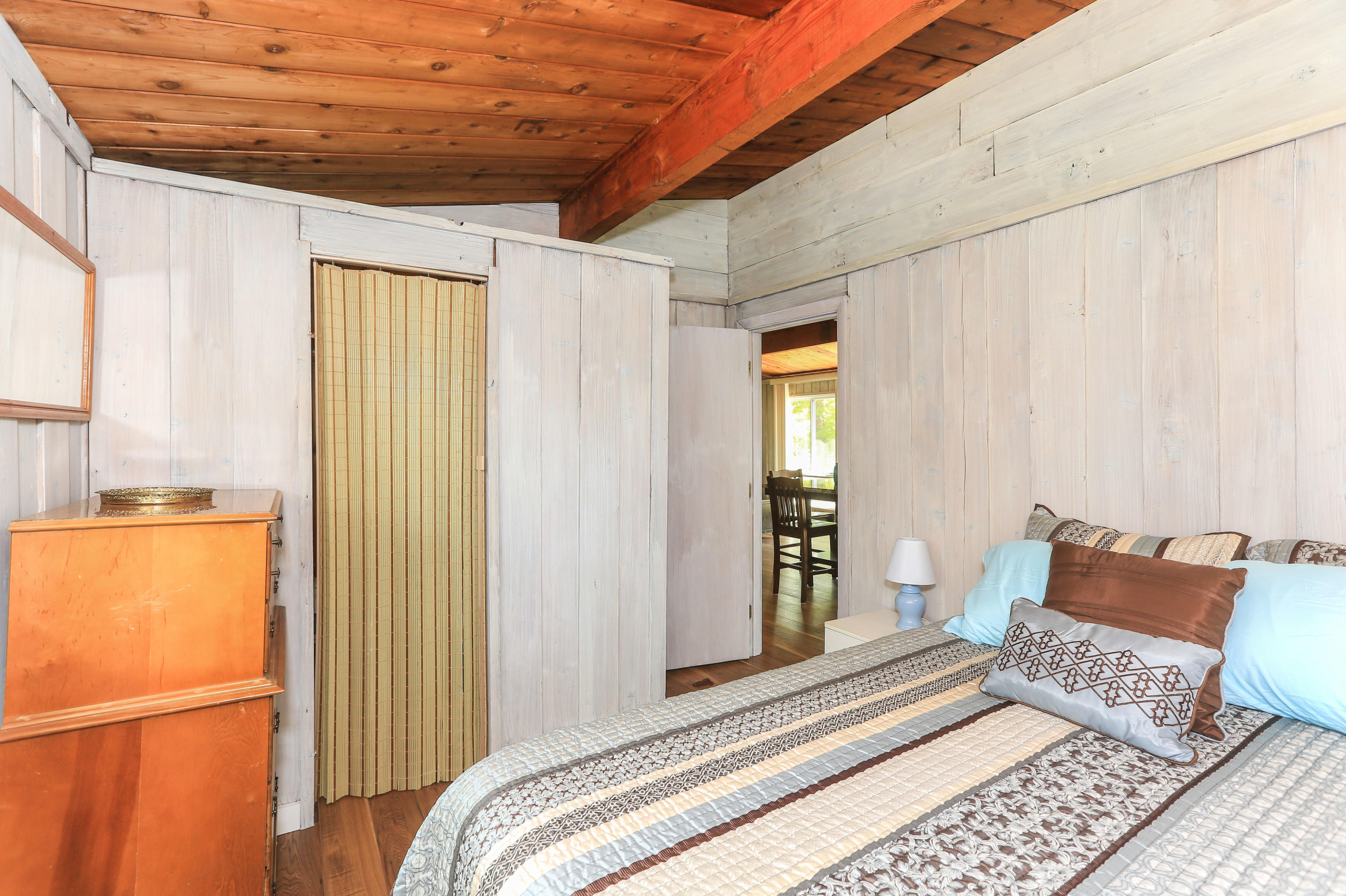 38 Lakeside Drive Marstons Mills, MA 02648 - Photo 13 of 21 a bedroom with a bed and a window