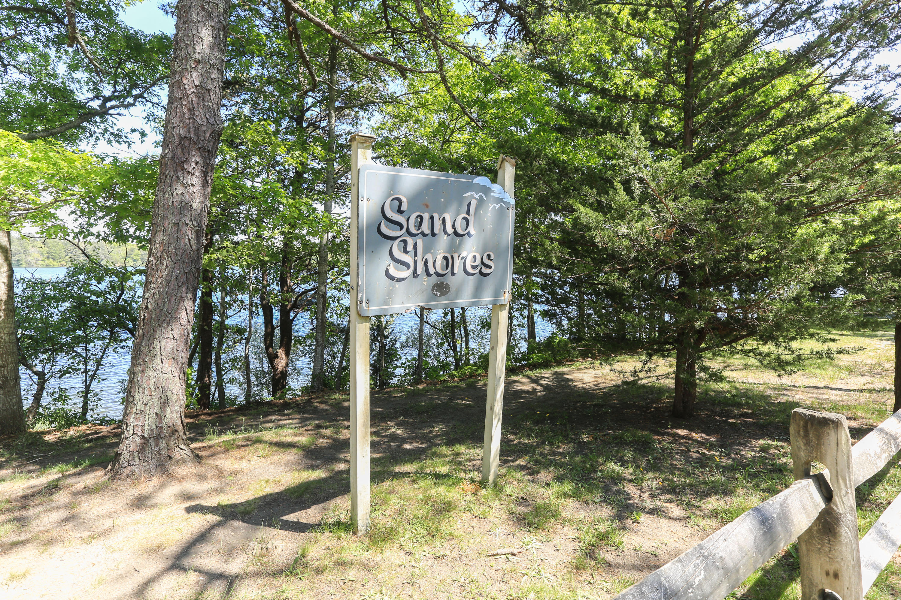 38 Lakeside Drive Marstons Mills, MA 02648 - Photo 18 of 21 a sign board with a tree