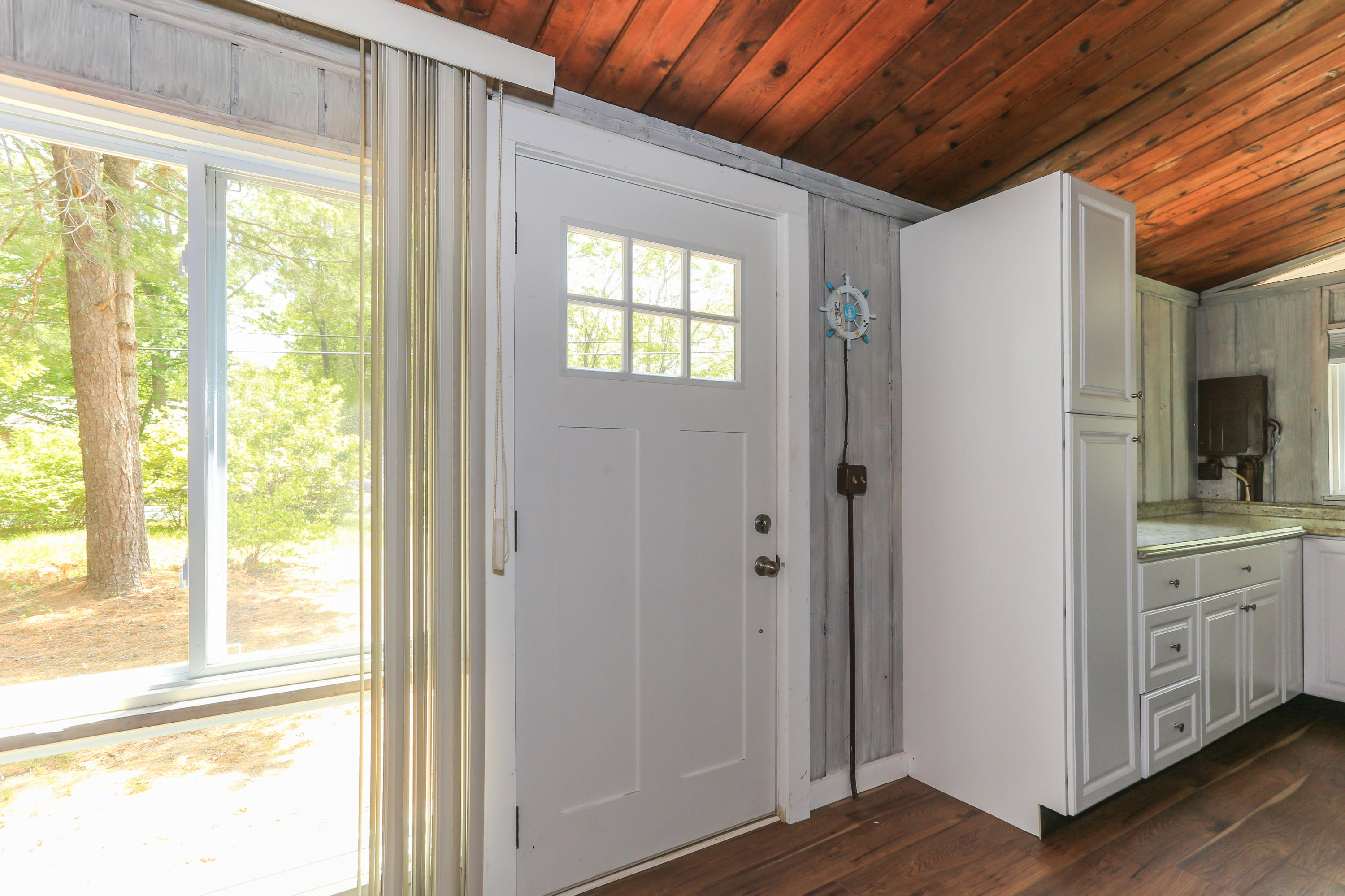 38 Lakeside Drive Marstons Mills, MA 02648 - Photo 3 of 21 a view of an empty room with window and wooden floor