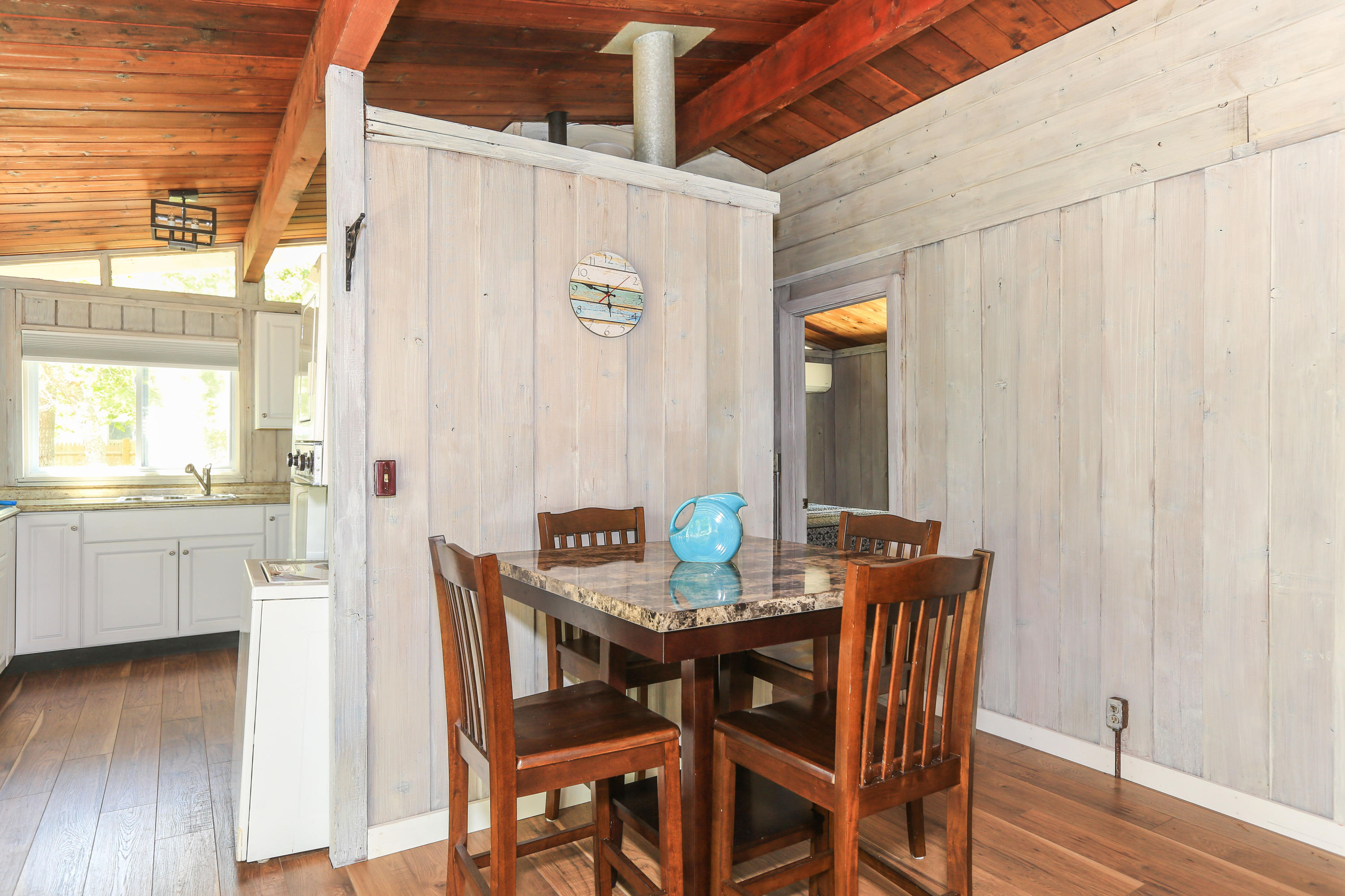 38 Lakeside Drive Marstons Mills, MA 02648 - Photo 6 of 21 a view of a dining room with furniture and wooden floor