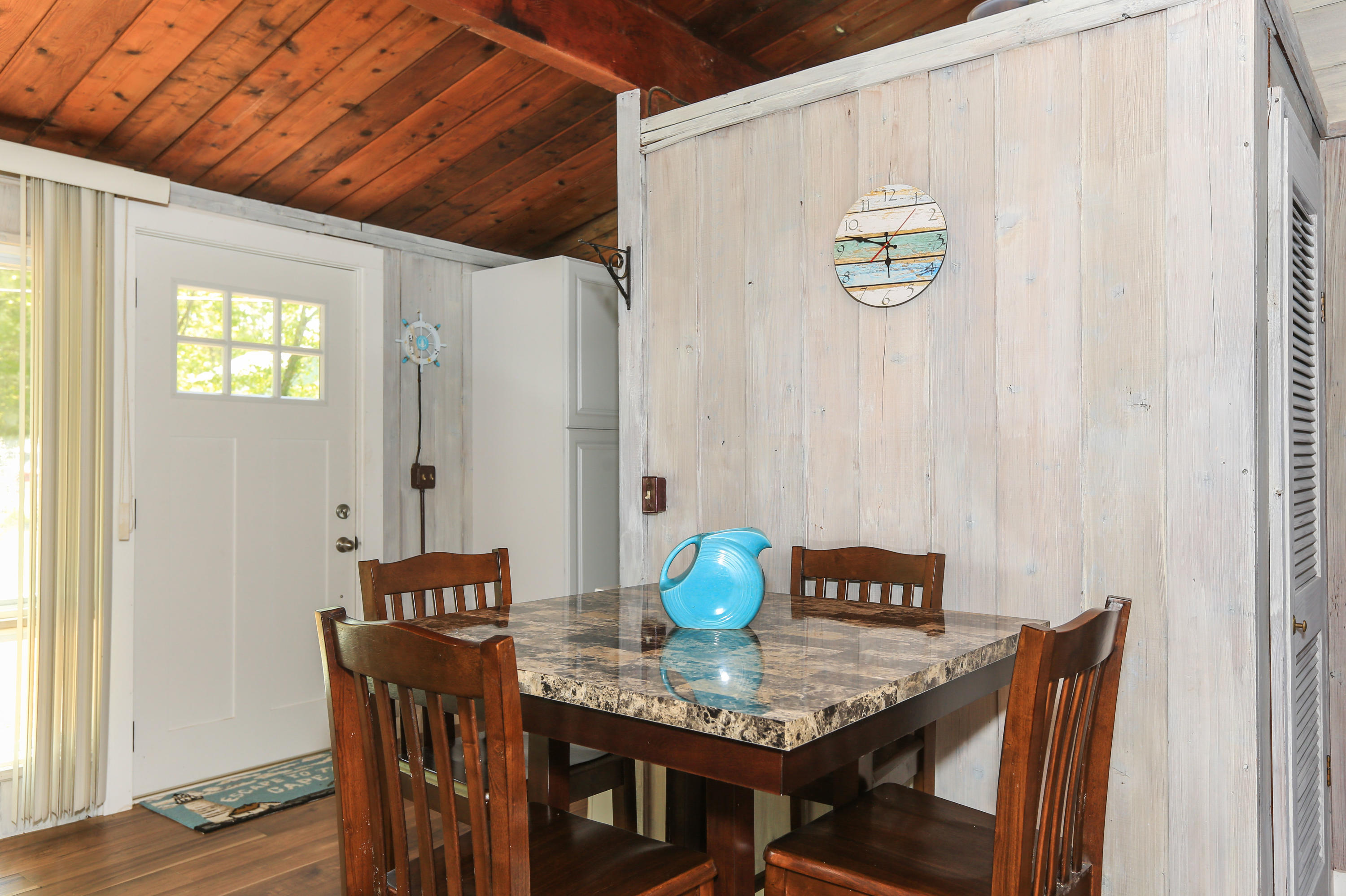 38 Lakeside Drive Marstons Mills, MA 02648 - Photo 7 of 21 a view of a dining room with furniture and wooden floor
