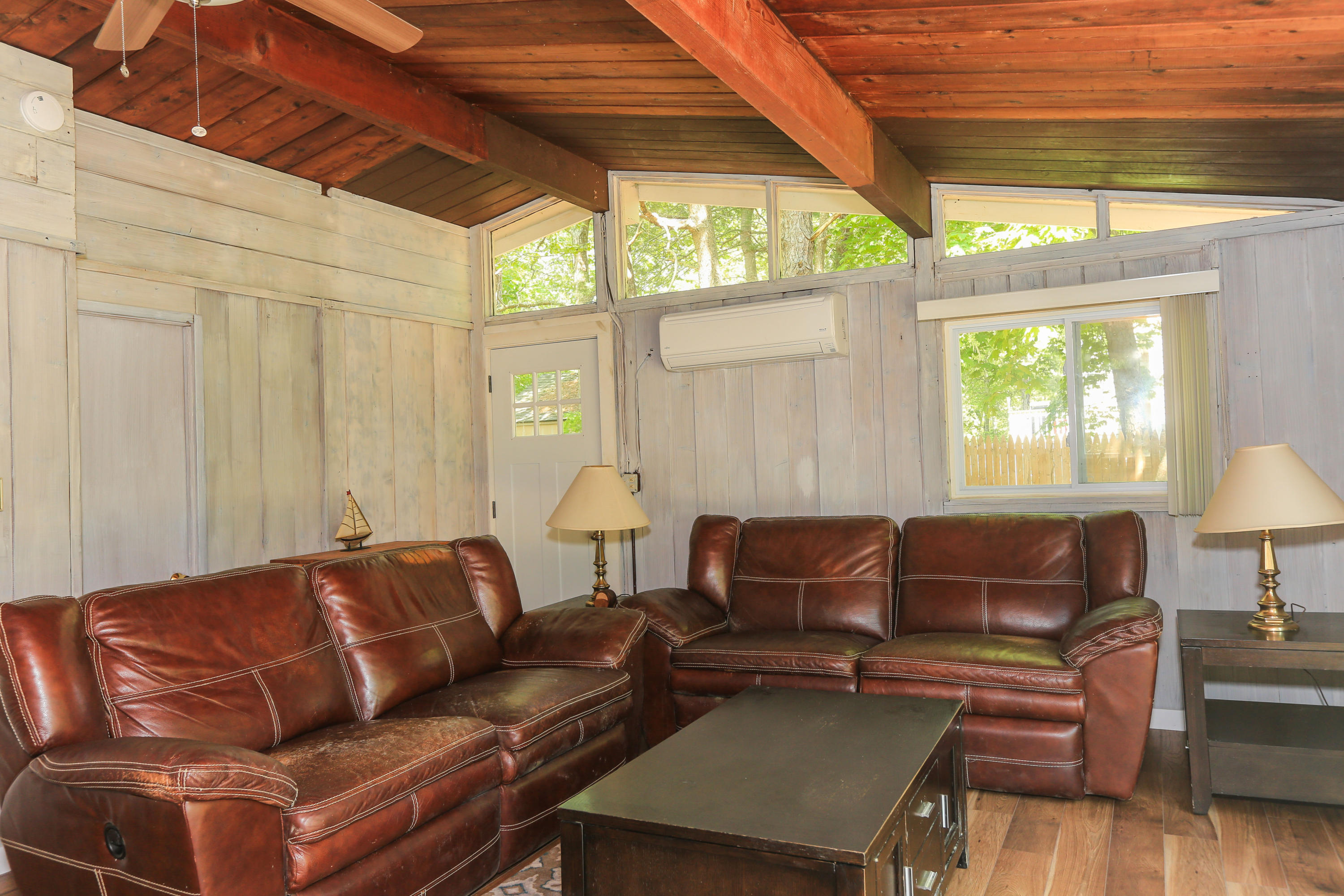 38 Lakeside Drive Marstons Mills, MA 02648 - Photo 8 of 21 a living room with furniture and a large window