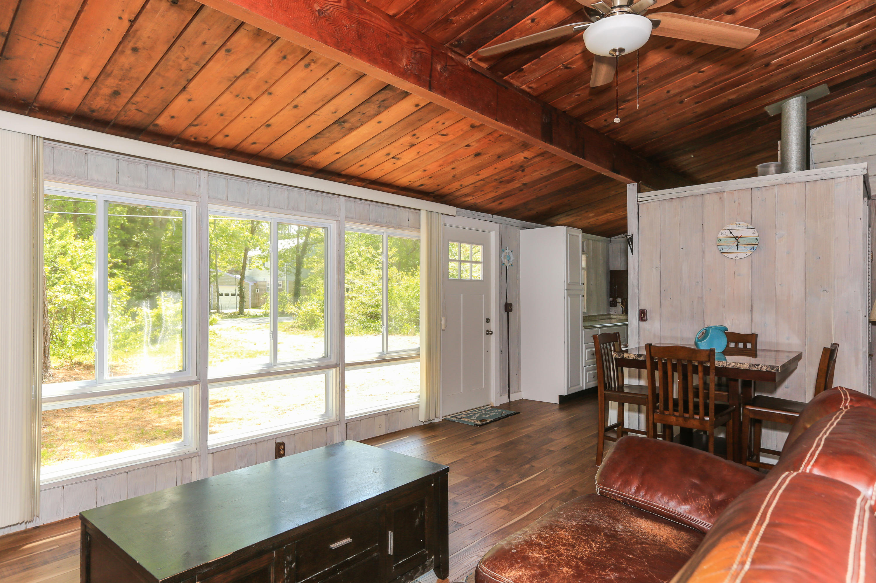 38 Lakeside Drive Marstons Mills, MA 02648 - Photo 10 of 21 a view of a dining room with furniture window and outside view