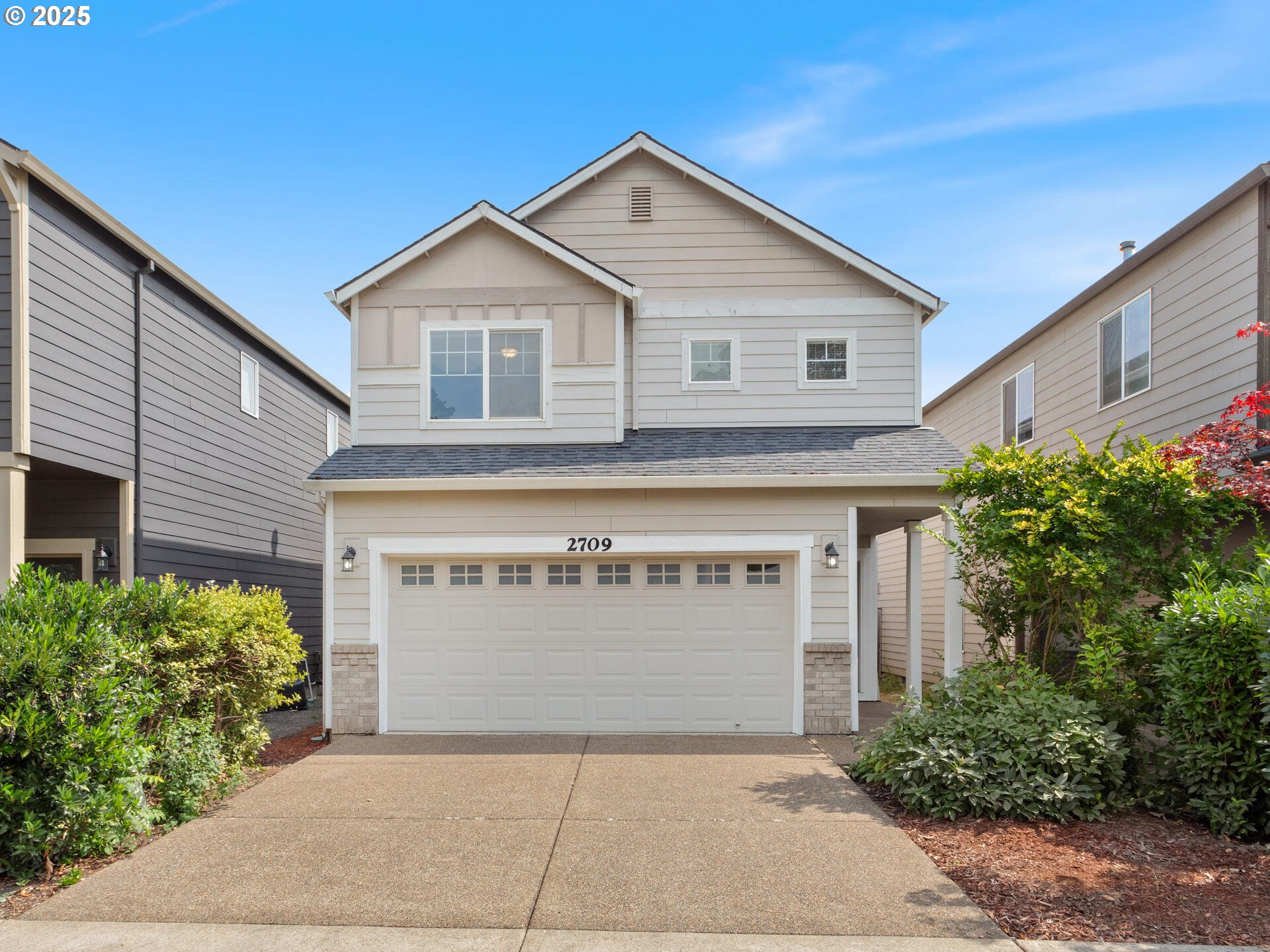 a view of front of house with garage