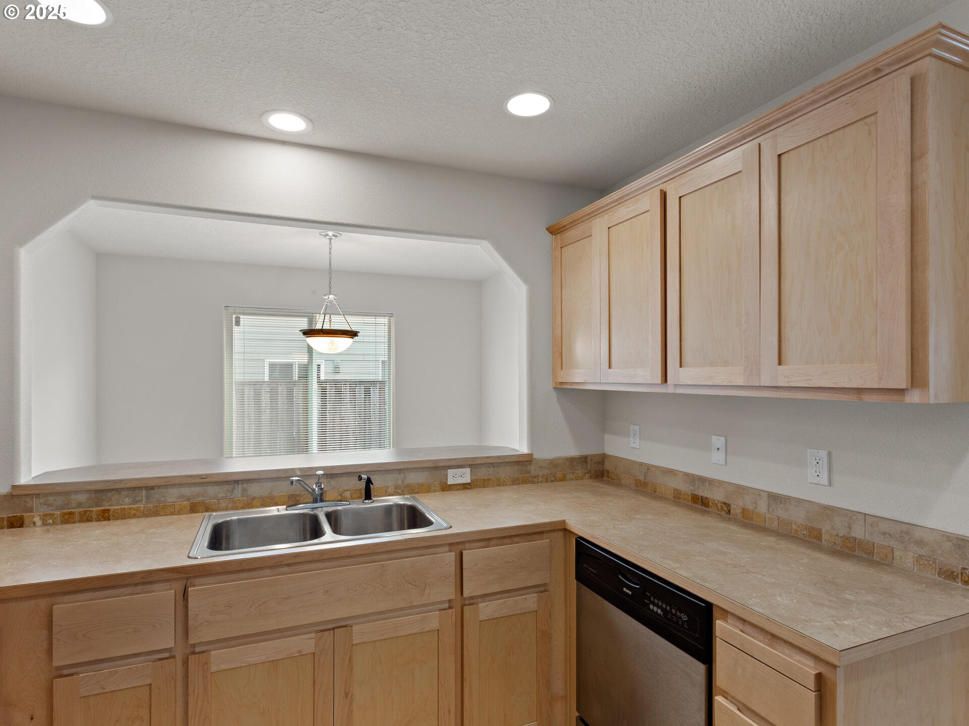 2709 Fletch Street Forest Grove, OR 97116 - Photo 21 of 44 a kitchen with a sink and cabinets
