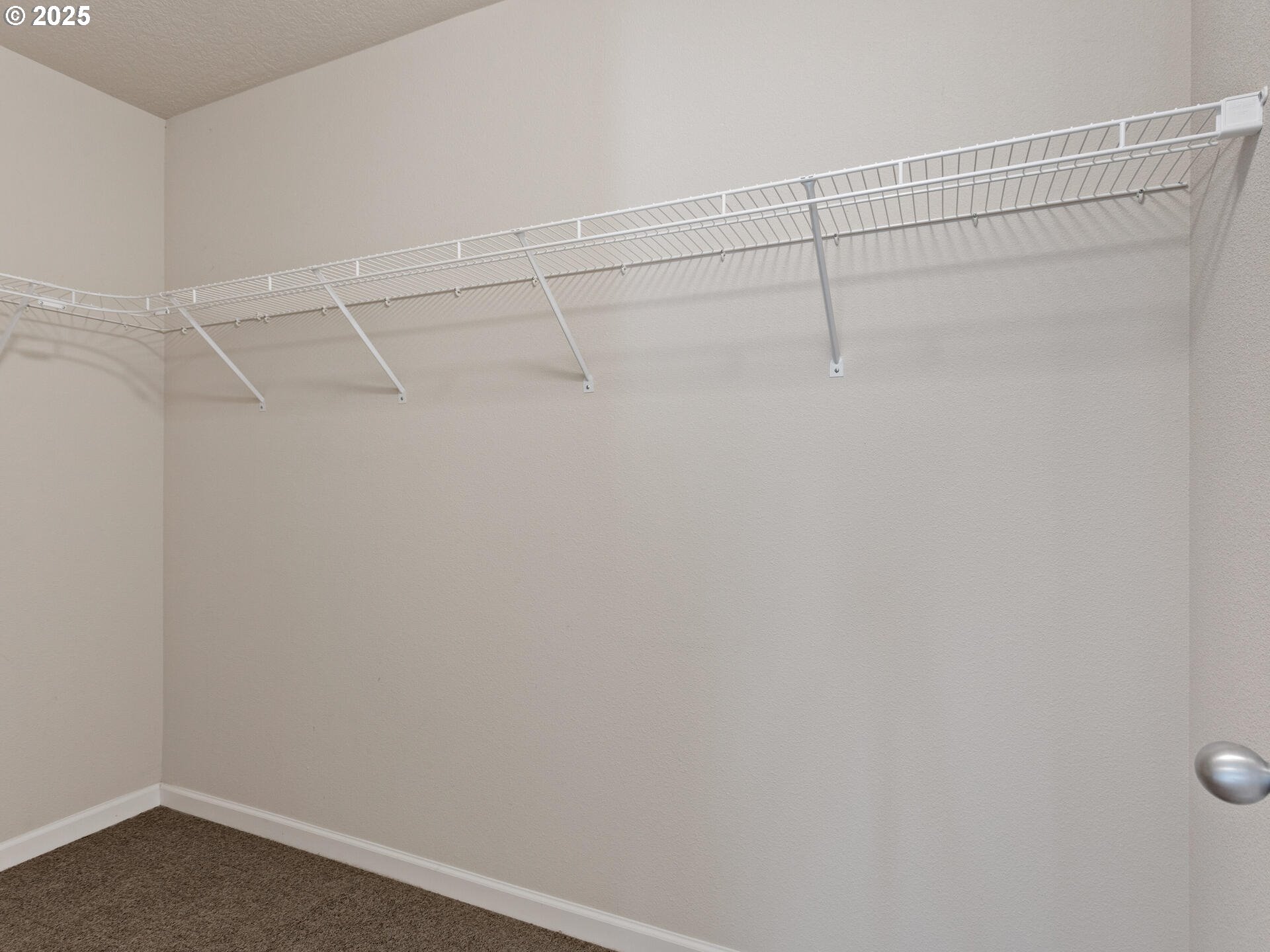 2709 Fletch Street Forest Grove, OR 97116 - Photo 31 of 44 a view of a room with racks on the wall