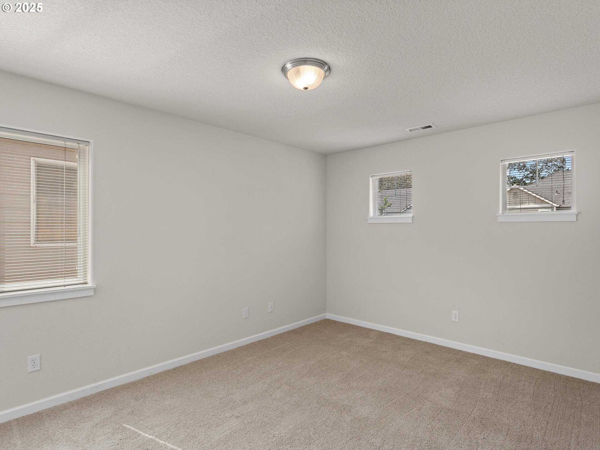 2709 Fletch Street Forest Grove, OR 97116 - Photo 34 of 44 an empty room with a window