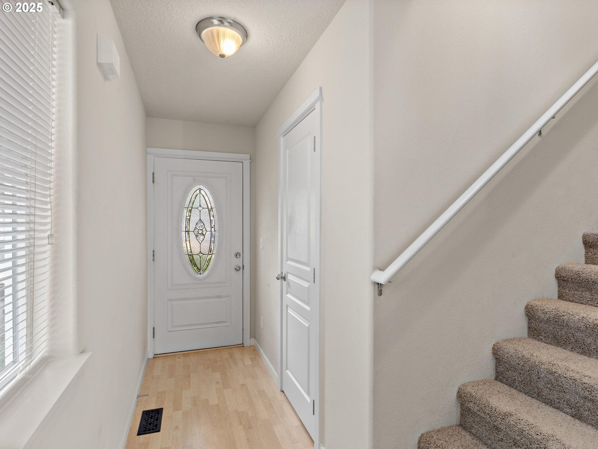 2709 Fletch Street Forest Grove, OR 97116 - Photo 8 of 44 a view of entryway with stairs and furniture