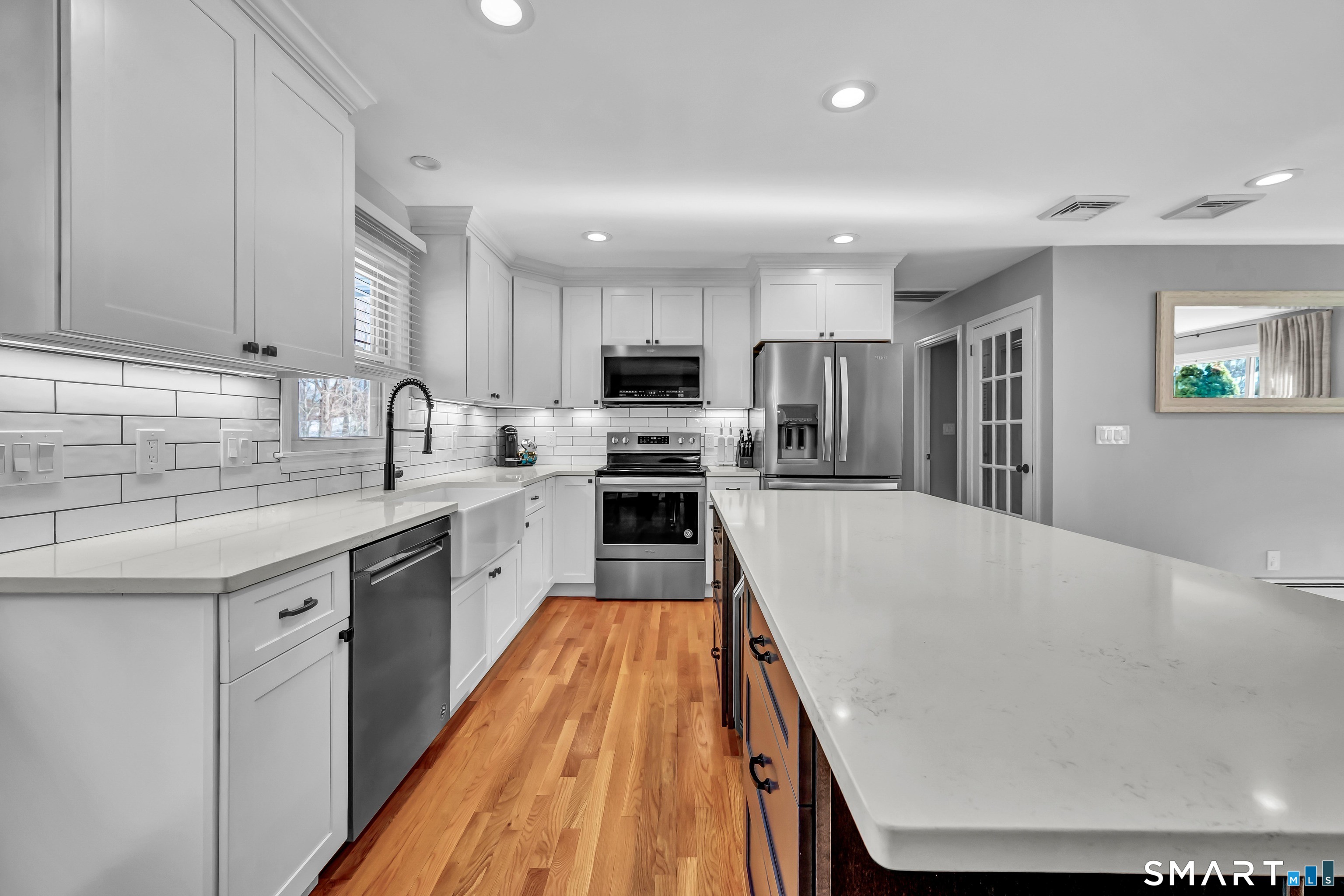 23 Federal Road Shelton, CT 06484 - Photo 9 of 39 Kitchen with view of hallway and door to basment