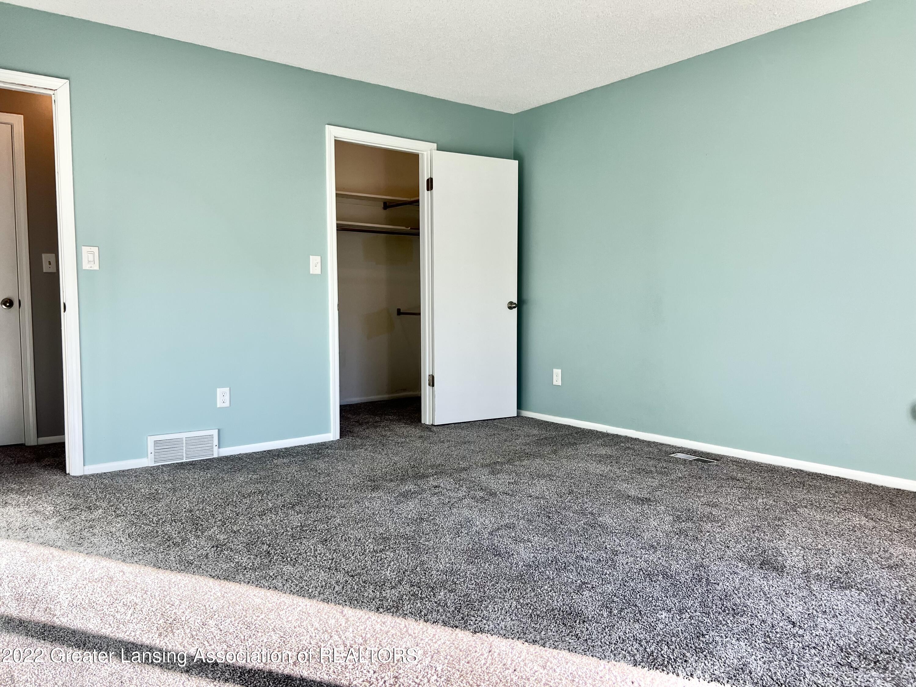 4707 Gull Road, Unit 46 Lansing, MI 48917 - Photo 23 of 27 Primary Closet