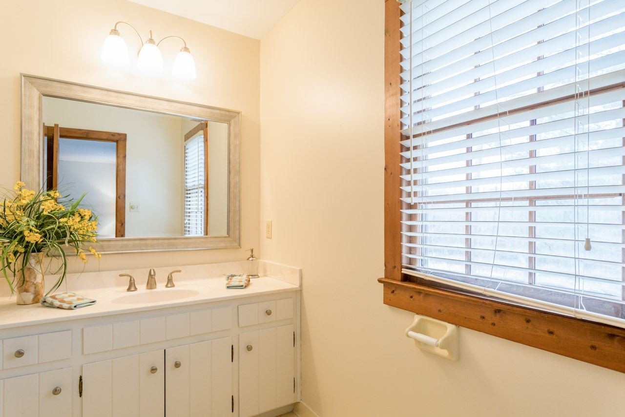 10405 Boxelder Drive Raleigh, NC 27613 - Photo 19 of 25 Freshly painted, with new mirror and light fixture. Tiled Shower. Master Bath