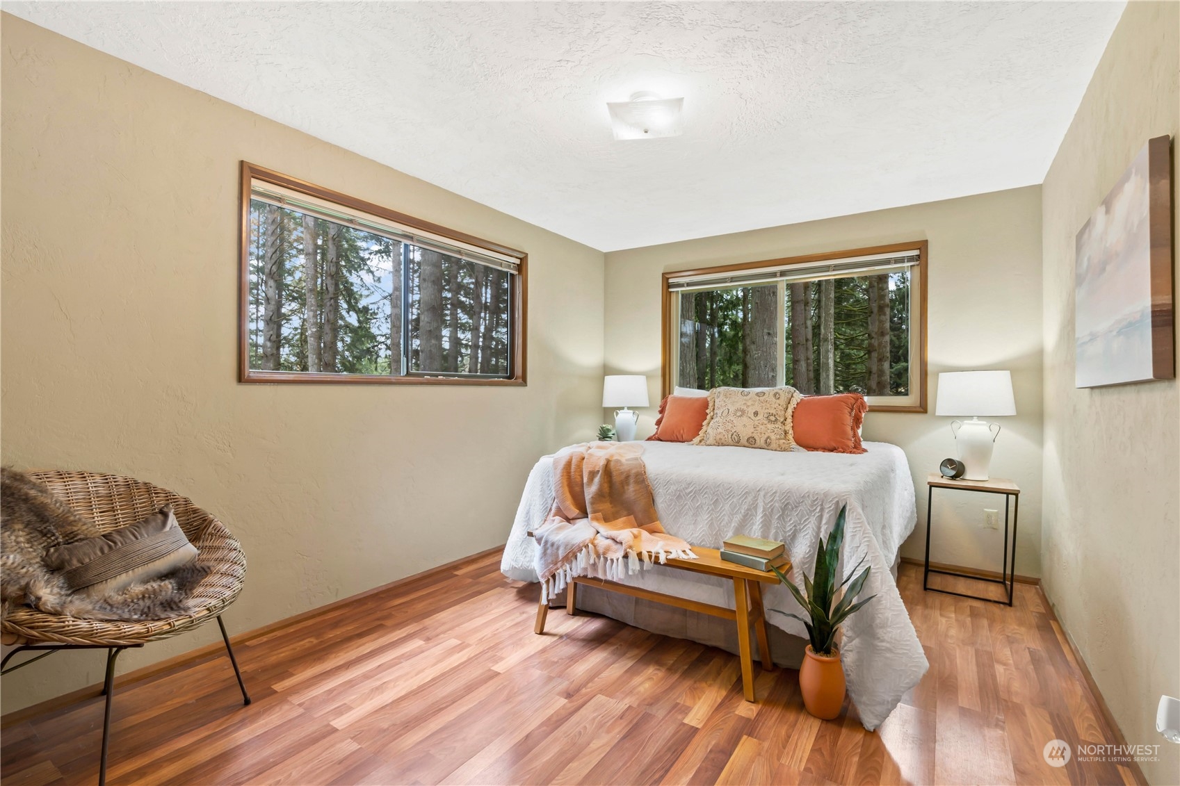 174 Frogner Road Chehalis, WA 98532 - Photo 16 of 40 a bedroom with a bed and wooden floor