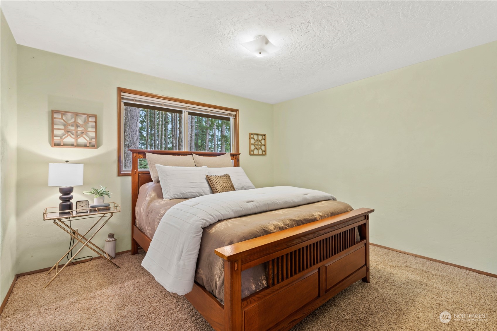 174 Frogner Road Chehalis, WA 98532 - Photo 18 of 40 a bed sitting in a bedroom next to a window