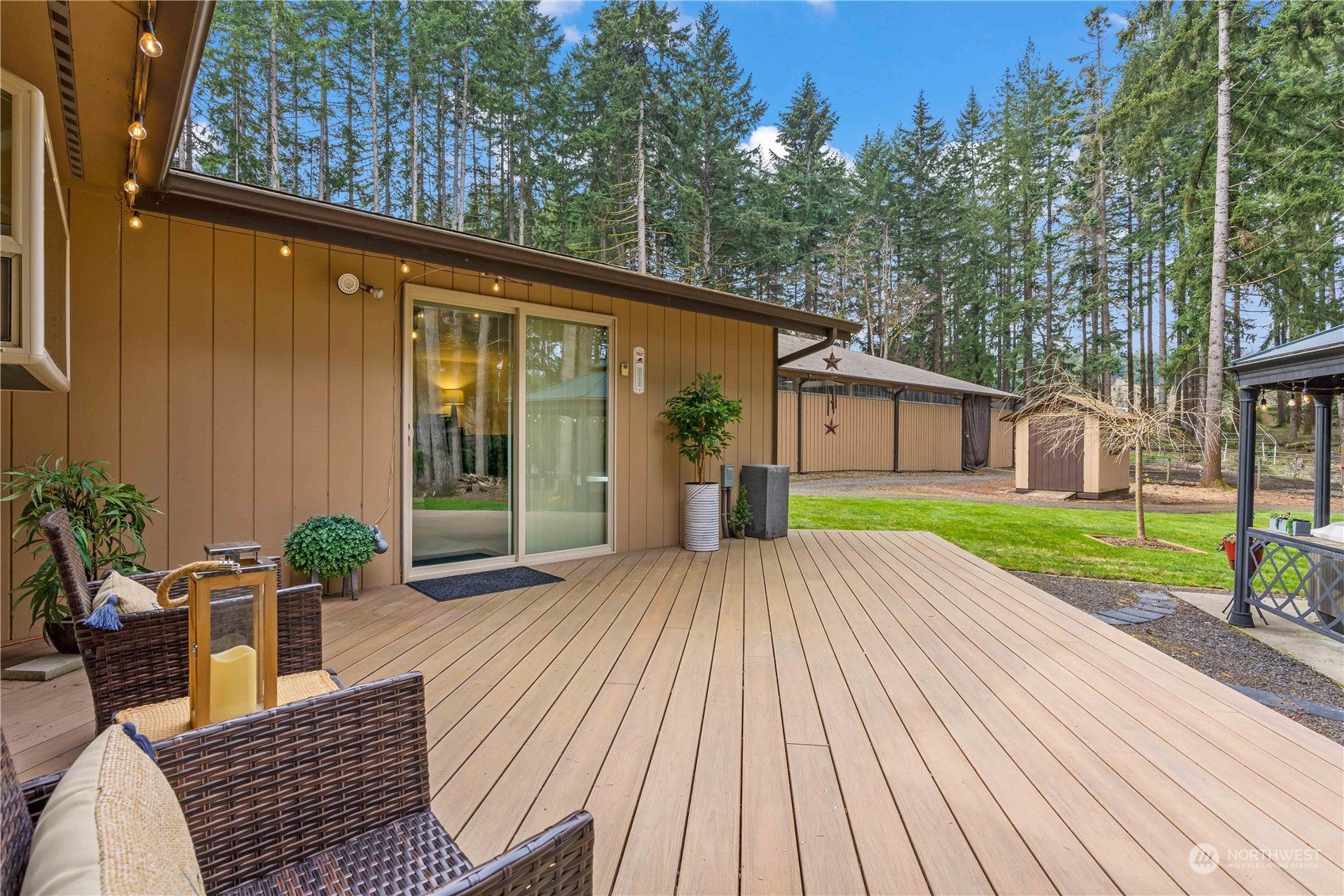 174 Frogner Road Chehalis, WA 98532 - Photo 19 of 40 a view of a house with backyard and sitting area