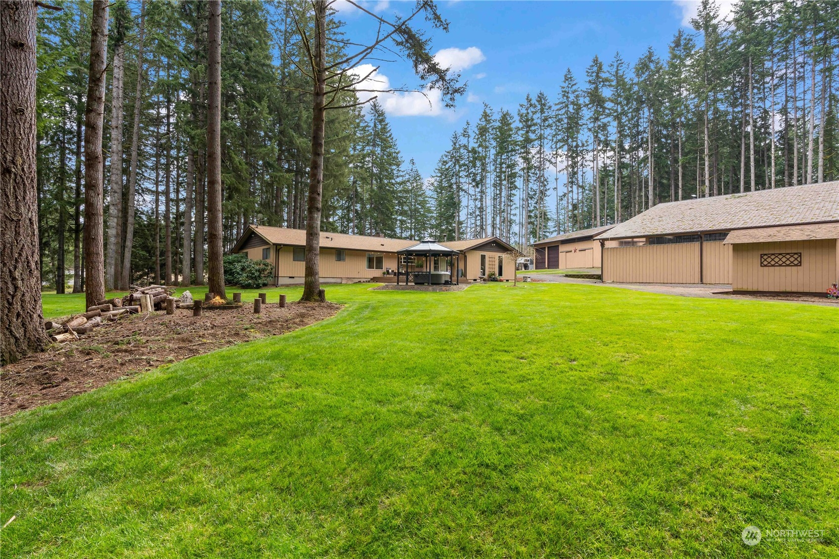 174 Frogner Road Chehalis, WA 98532 - Photo 24 of 40 a view of a house with a yard porch and sitting area