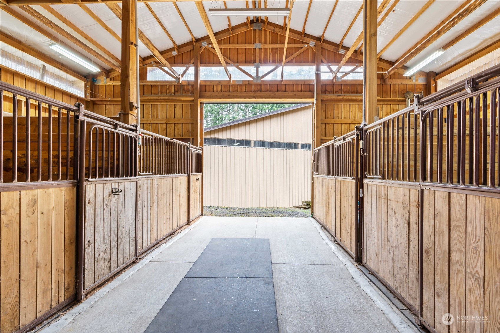 174 Frogner Road Chehalis, WA 98532 - Photo 30 of 40 a view of a balcony with a floor to ceiling window with wooden fence