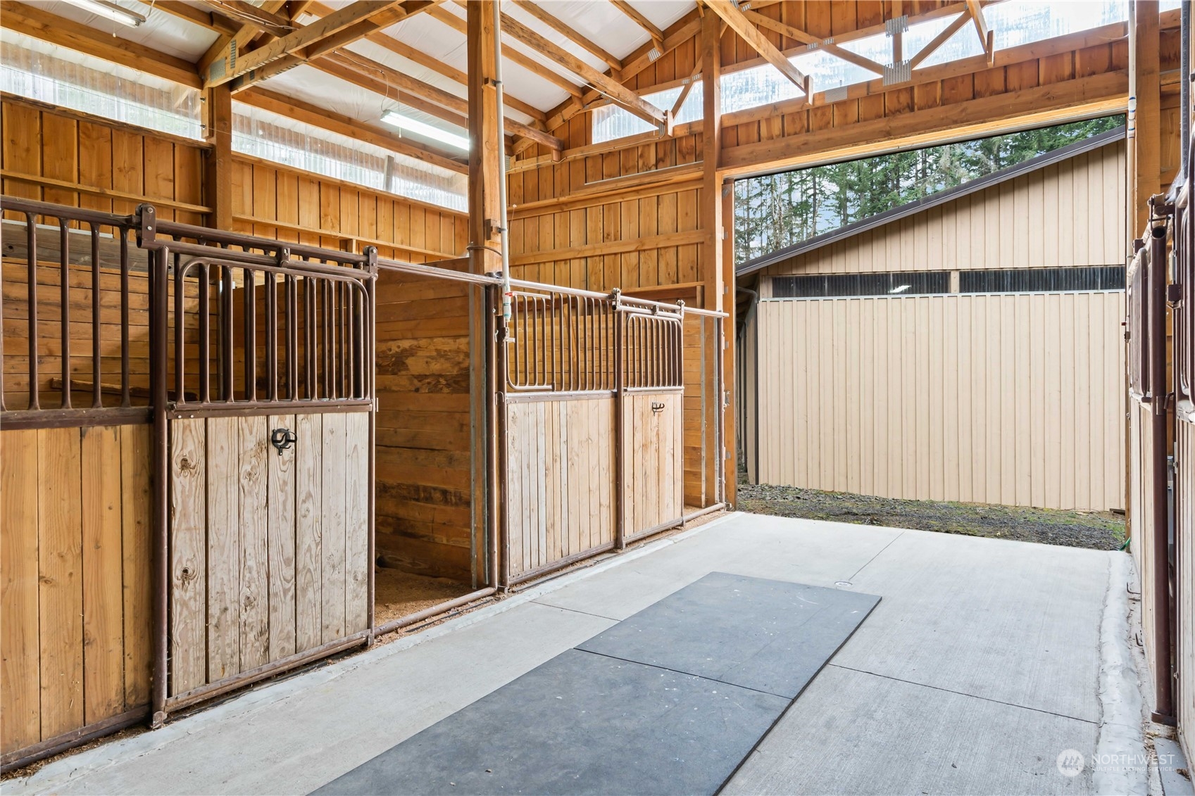 174 Frogner Road Chehalis, WA 98532 - Photo 31 of 40 a view of a house with a wooden bench