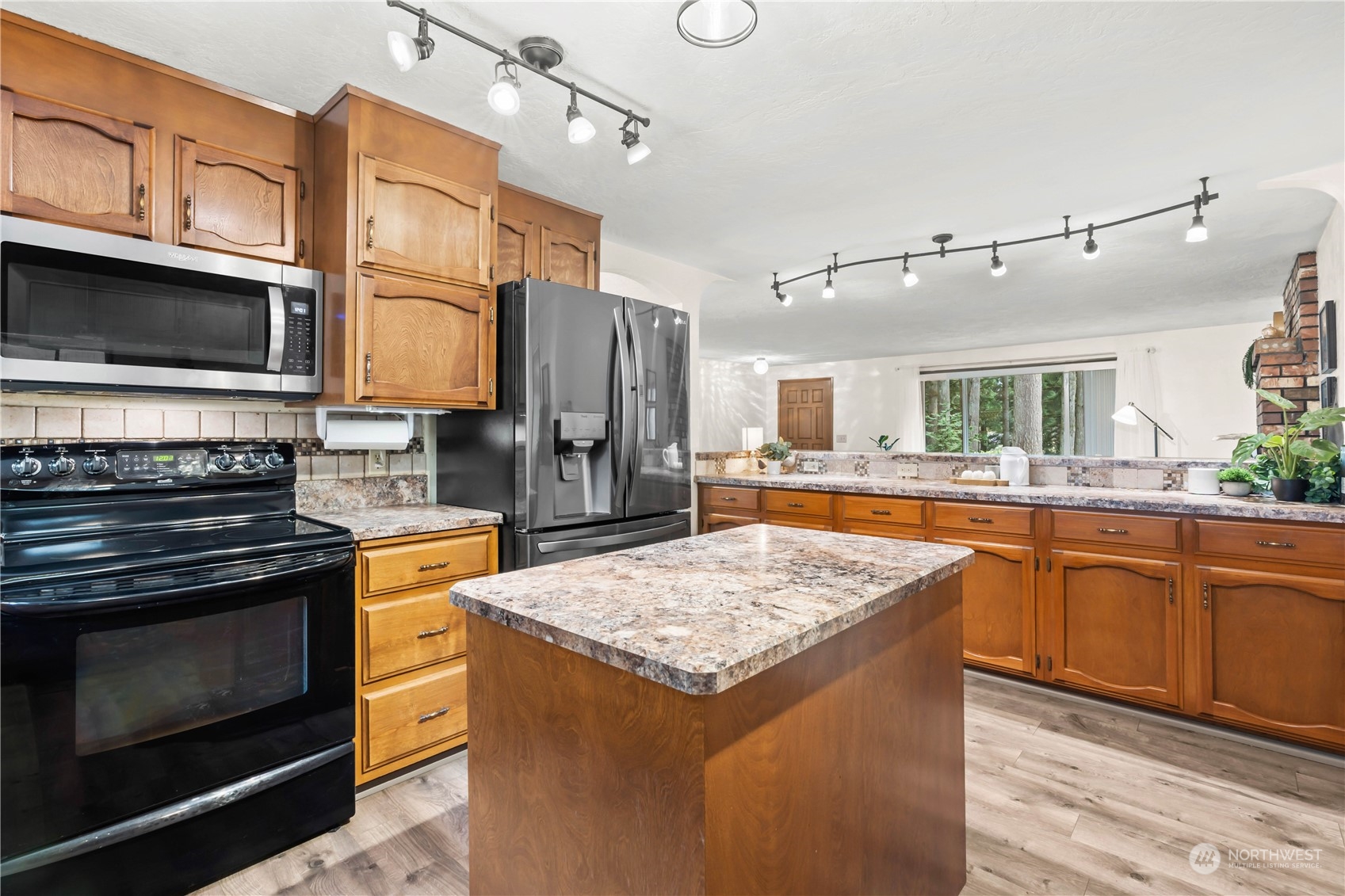 174 Frogner Road Chehalis, WA 98532 - Photo 7 of 40 a kitchen with stainless steel appliances granite countertop a sink stove and refrigerator