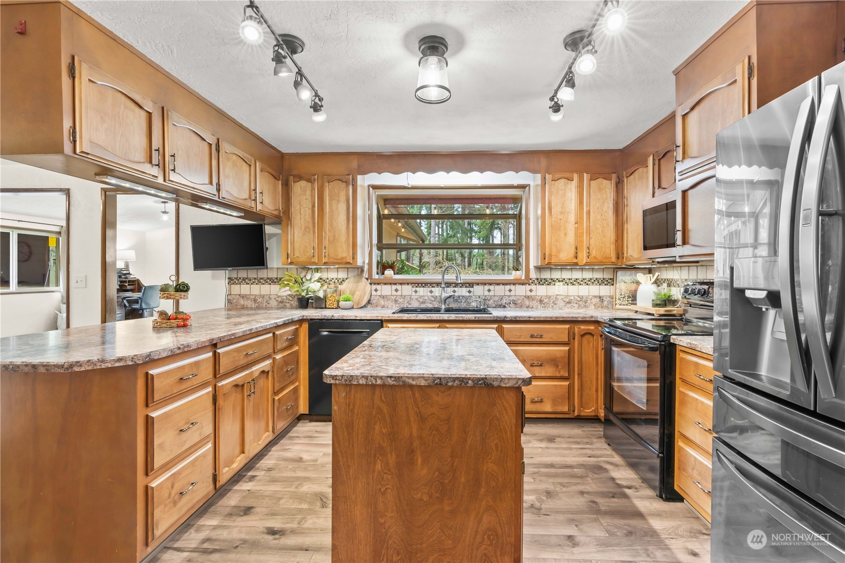174 Frogner Road Chehalis, WA 98532 - Photo 9 of 40 a kitchen with stainless steel appliances granite countertop sink stove and refrigerator