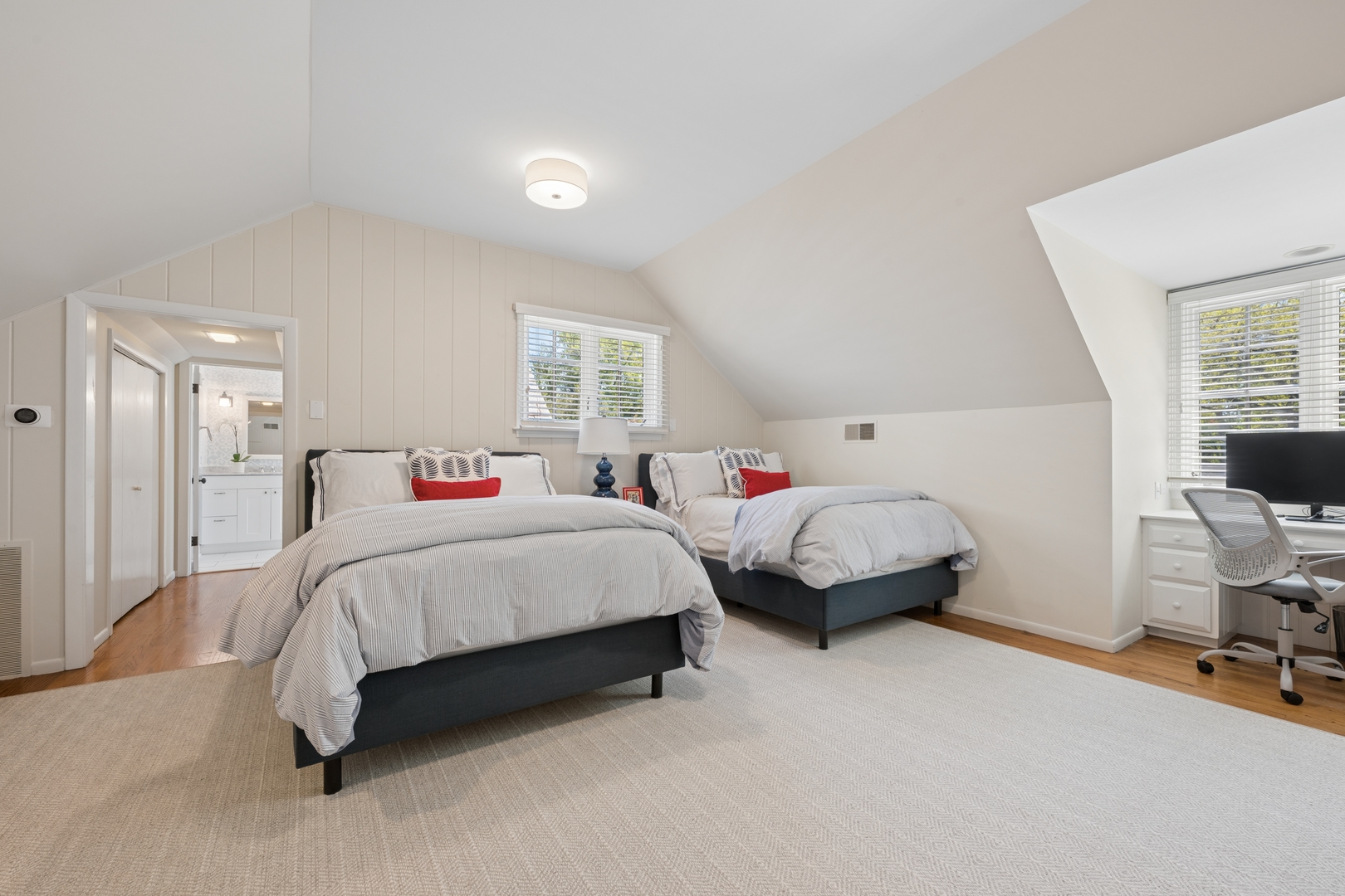 936 Sunset Road Winnetka, IL 60093 - Photo 29 of 50 a spacious bedroom with a bed and window