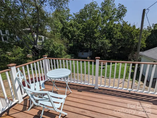 a view of a chair and tables