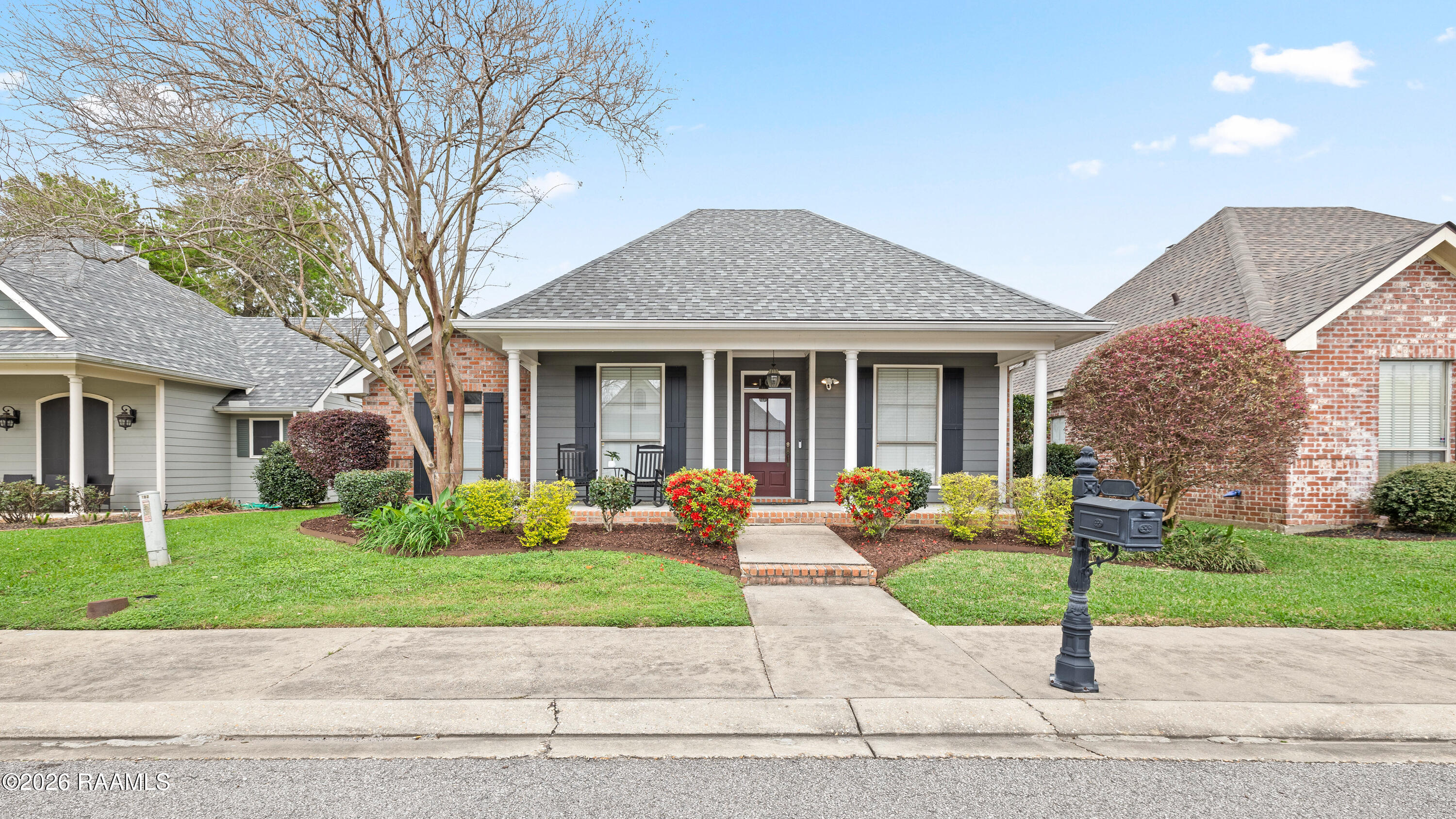 102 Lighthouse Point Circle Youngsville, LA 70592 - Photo 1 of 25 COM 102 Lighthouse Youngsville-1