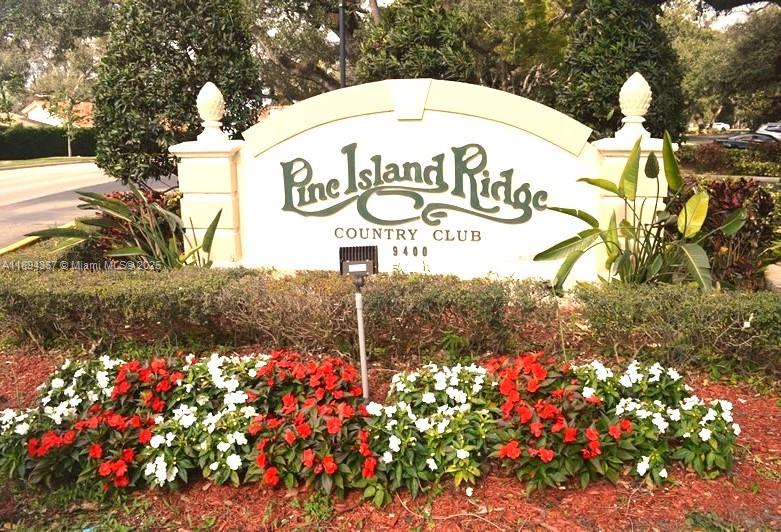 9441 Live Oak Place, Unit 207 Davie, FL 33324 - Photo 1 of 24 a sign on the side of a road