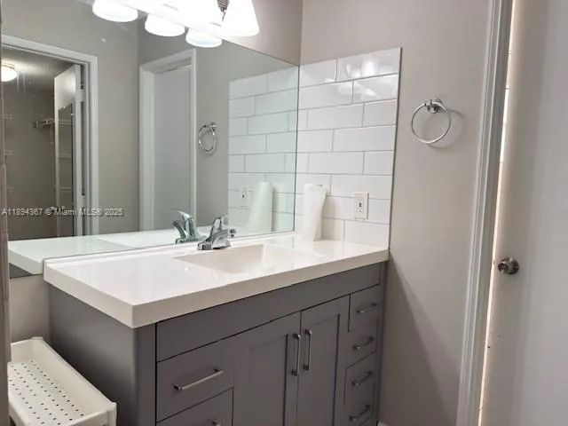 a bathroom with a toilet and a sink