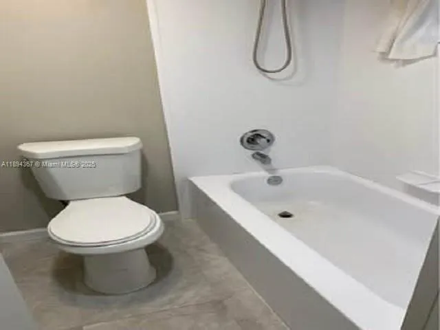 a view of a two chair in the patio