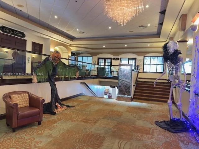 a view of a backyard with swimming pool