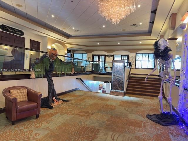 9441 Live Oak Place, Unit 207 Davie, FL 33324 - Photo 23 of 24 a view of a room with gym equipment