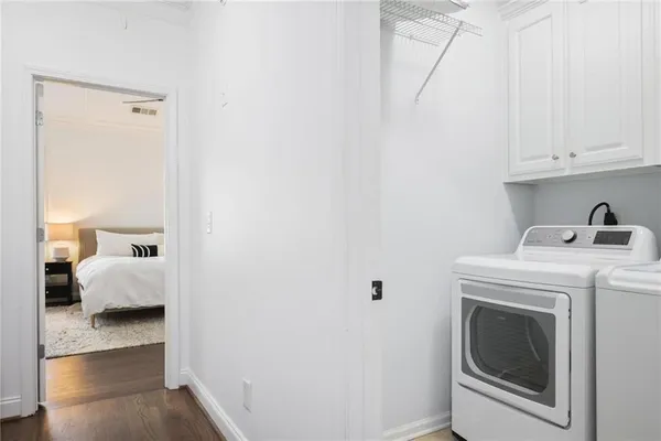 a utility room with dryer and washer