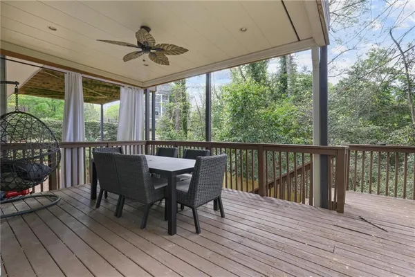 a view of a deck patio and outdoor seating