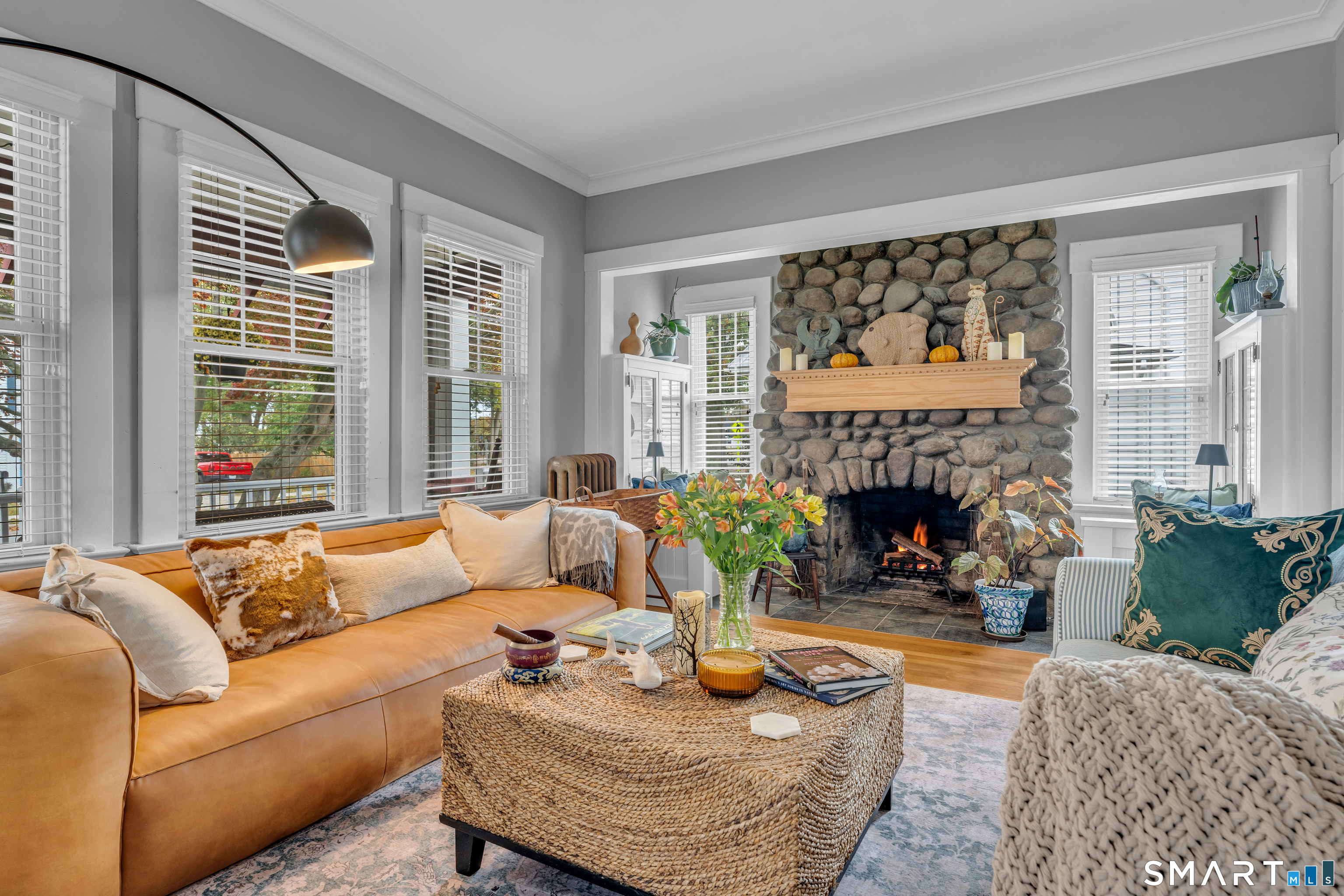 575 Ocean Avenue New London, CT 06320 - Photo 12 of 40 a living room with furniture and a fireplace